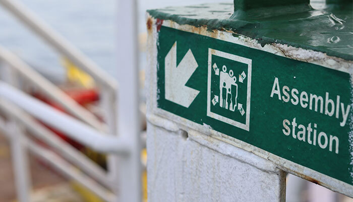 Evacuation sign on building