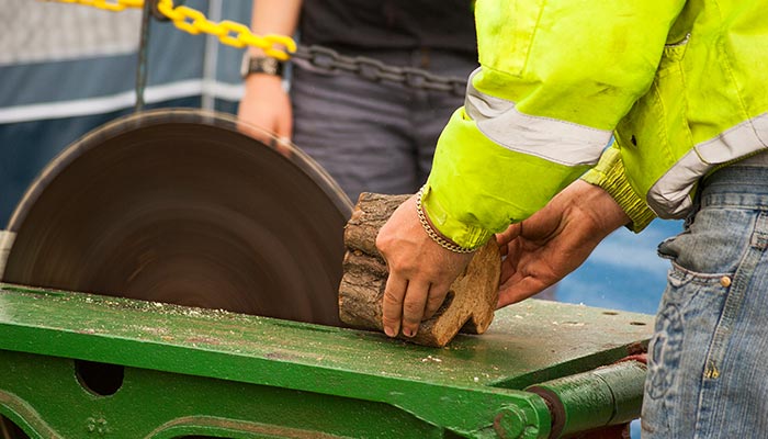 Worker operating blade without correct PPE